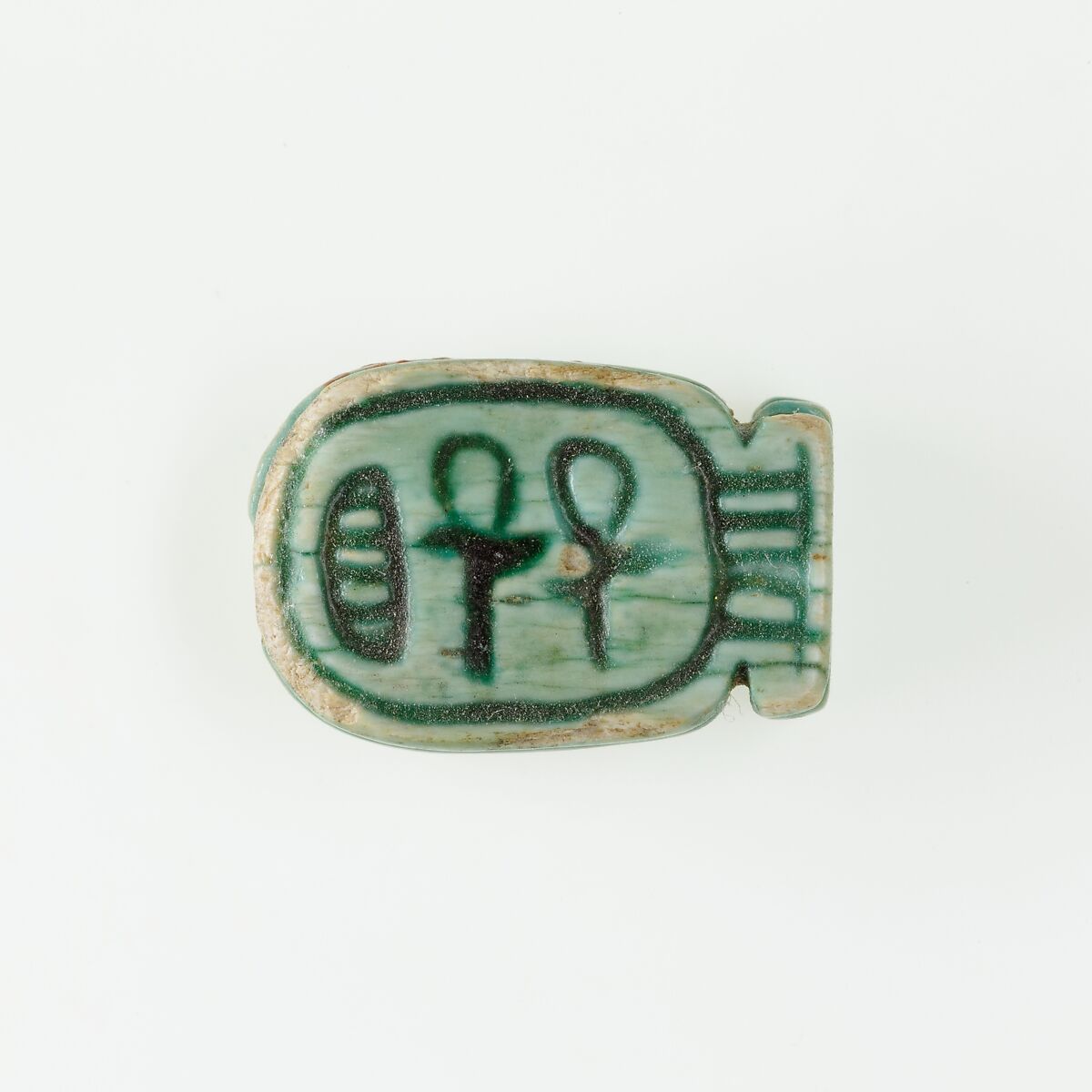 Plaque in the Form of a Cartouche; two ankhs; ankh, two nefers, Glazed steatite 