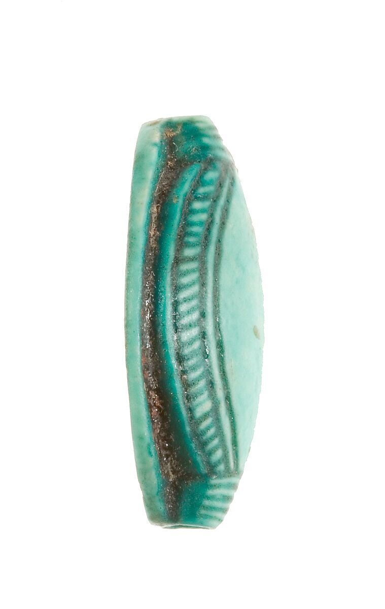 Cowroid Seal Amulet Inscribed with a Bolti Fish, Steatite (glazed)