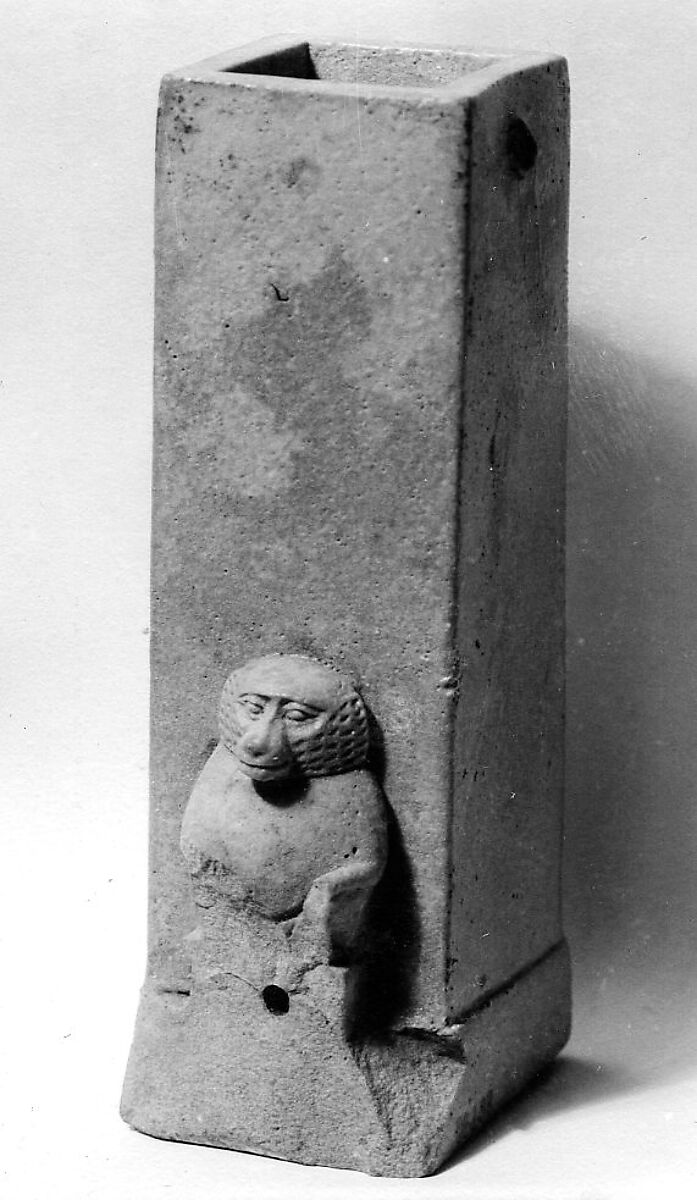 Clepsydra or water clock with squatting babooon, Faience