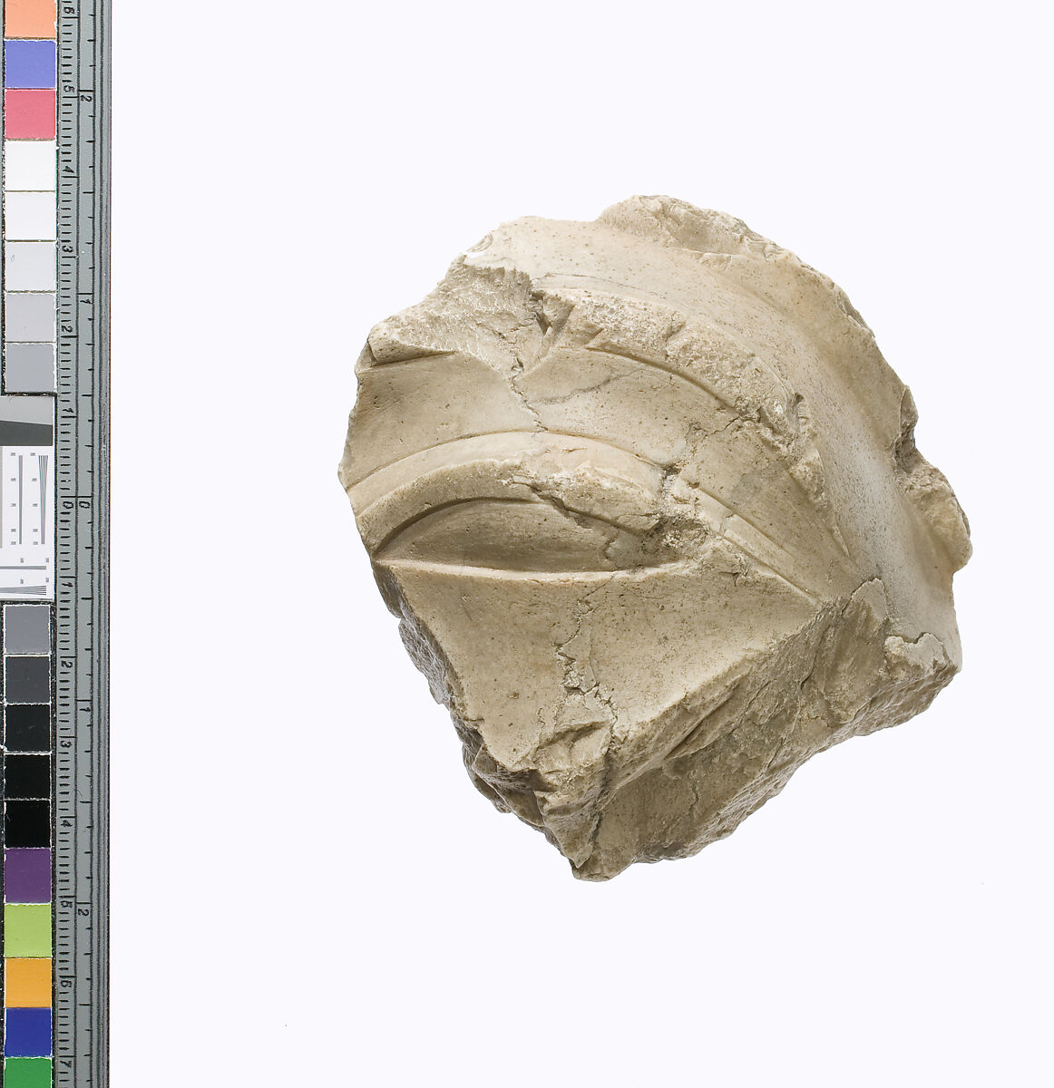Right eye and brow from head of king in the 'blue' crown, Indurated limestone