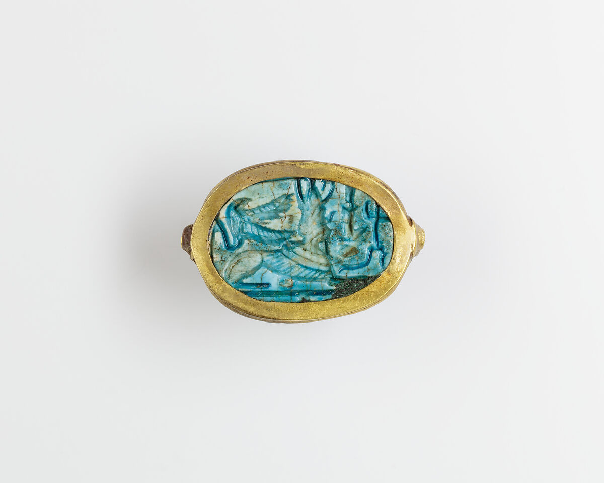 Human-headed scarab with device of sphinx and winged uraeus, Glazed steatite, gold