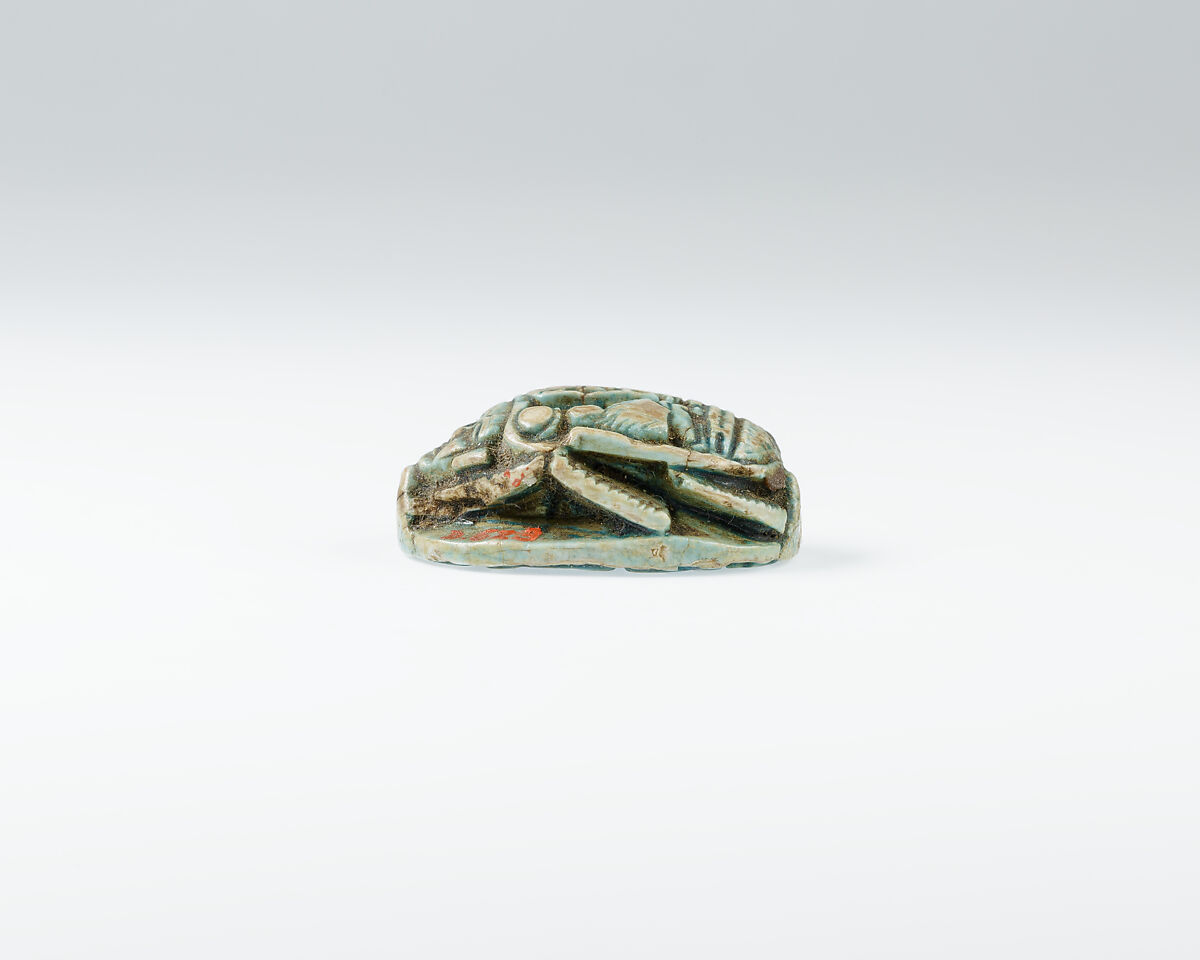 Scarab with ornate back including prenomen of Ramesses II and the phrase beloved of Maat and Thoth, Glazed steatite