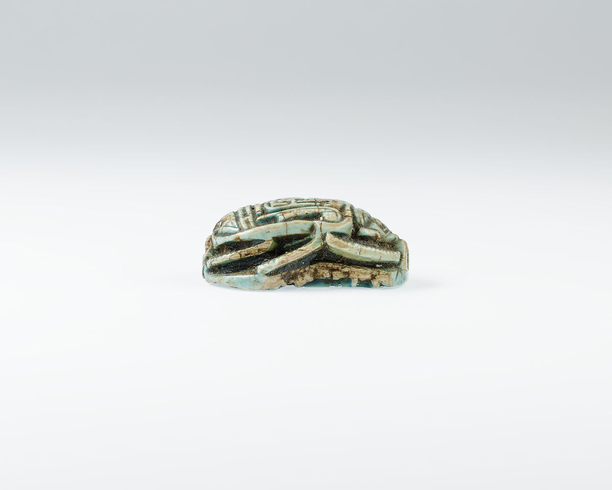 Scarab with ornate back including prenomen of Ramesses II and the phrase beloved of Maat and Thoth, Glazed steatite