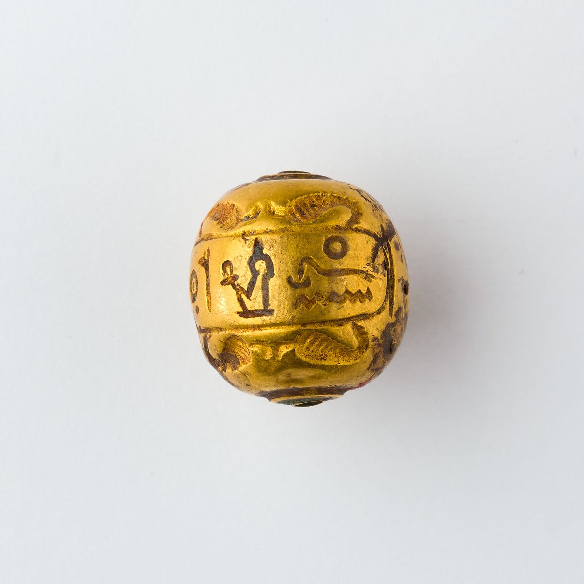 Hollow spherical bead with the Names of  Ramesses II and Queen Isetnefret, Gold 