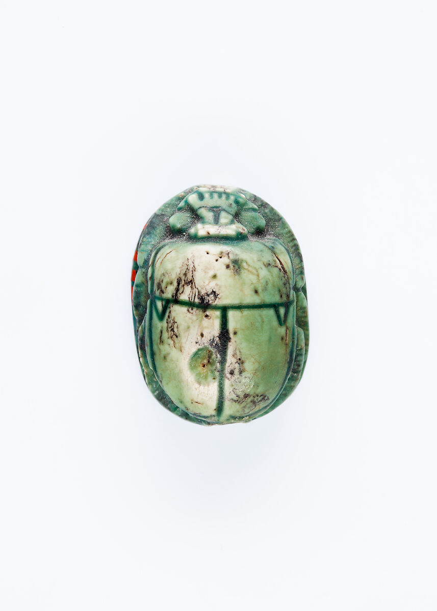 Scarab Depicting Seti II In His Chariot Shooting a Bow and Arrow., Glazed steatite