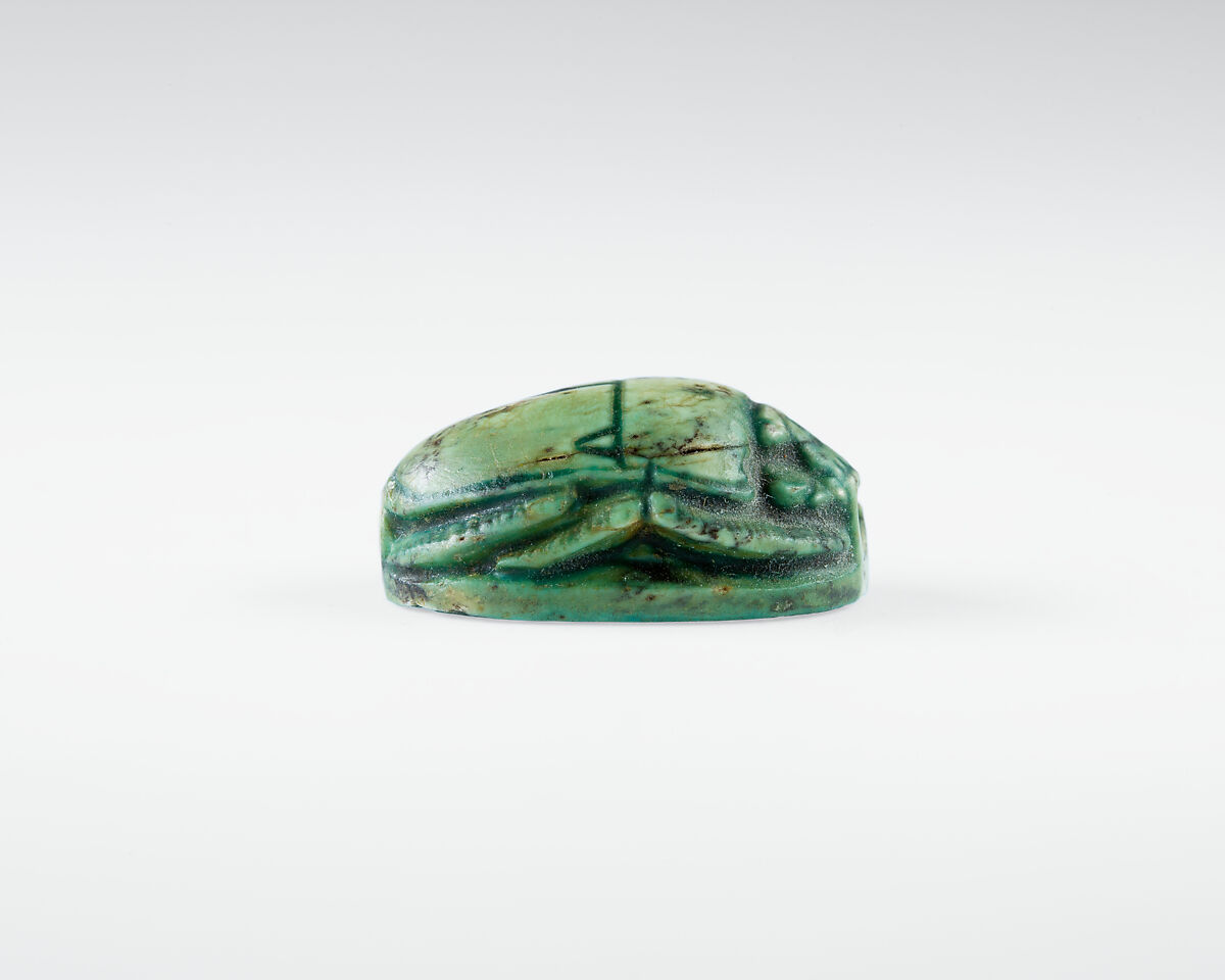 Scarab Depicting Seti II In His Chariot Shooting a Bow and Arrow., Glazed steatite