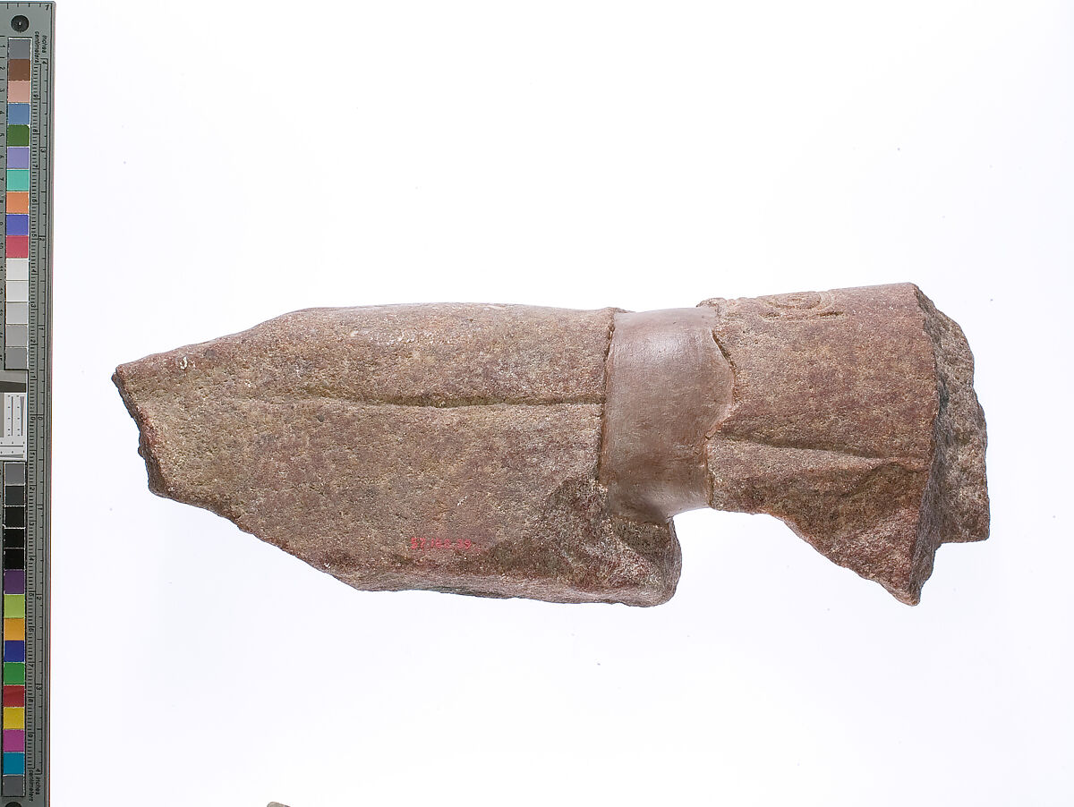 left hand and arm fragment with Aten cartouches from a statue supporting a stela?, Red quartzite