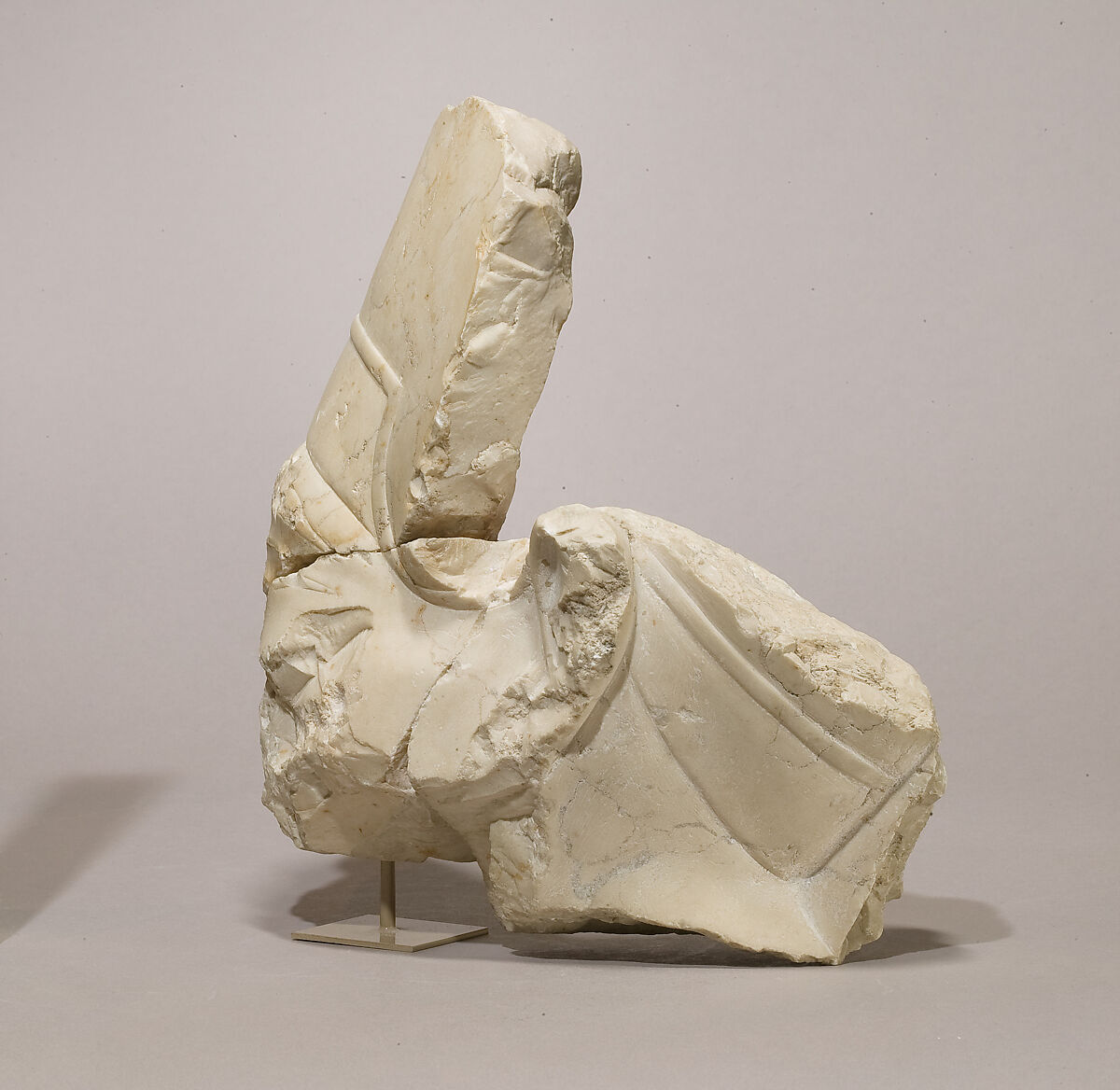 Head of Akhenaten in the blue crown, sign traces at nape of neck, Indurated limestone