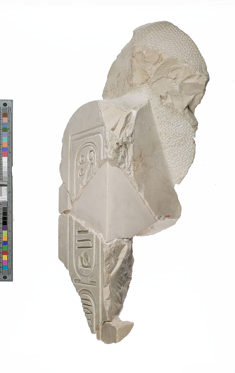 Head of Akhenaten with back pillar inscribed with Aten names, Indurated limestone