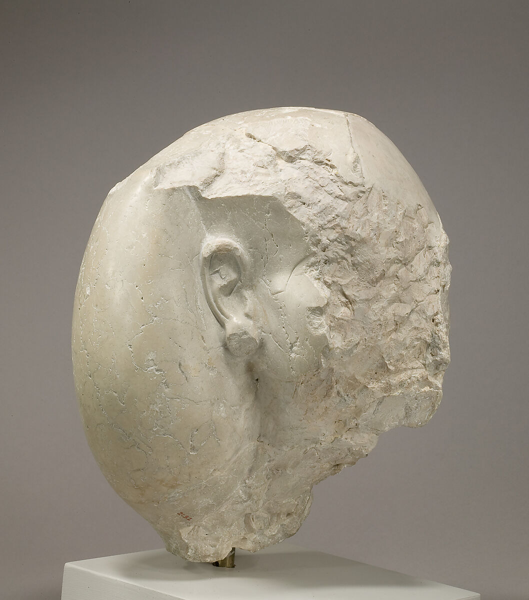 Head of king or queen in khat headdress, Indurated limestone