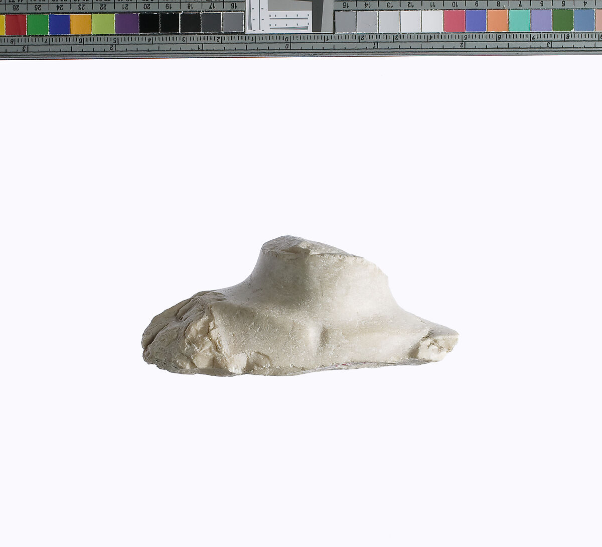 Chest of  statuette of Akhenaten prostrate (?), Indurated limestone 