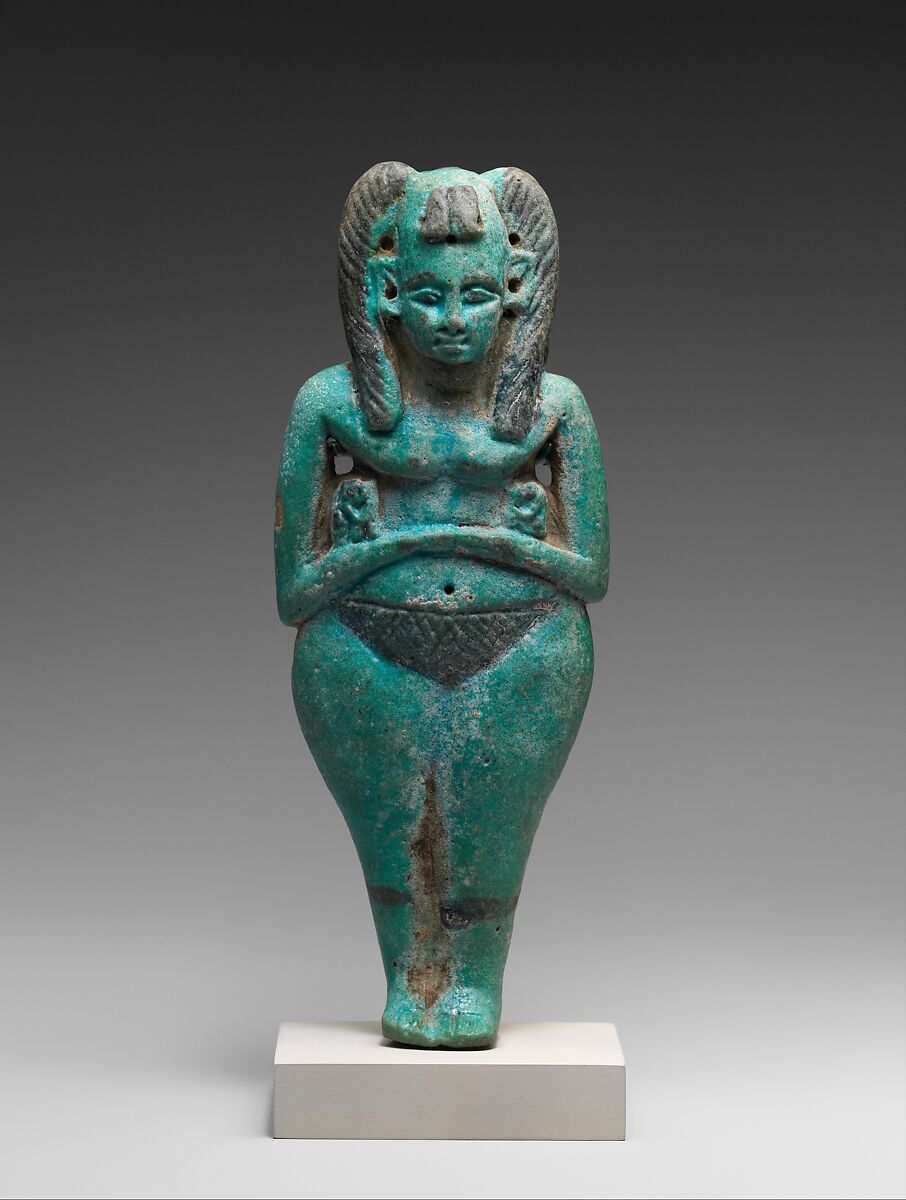 Nude female holding monkeys, Pale blue faience 