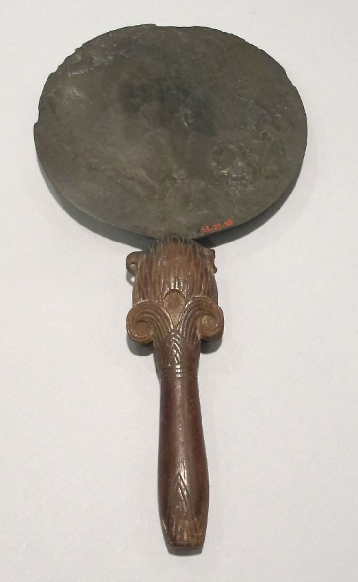 Mirror with a Lotus Handle Decorated with the Head of Bes, Bronze or copper alloy