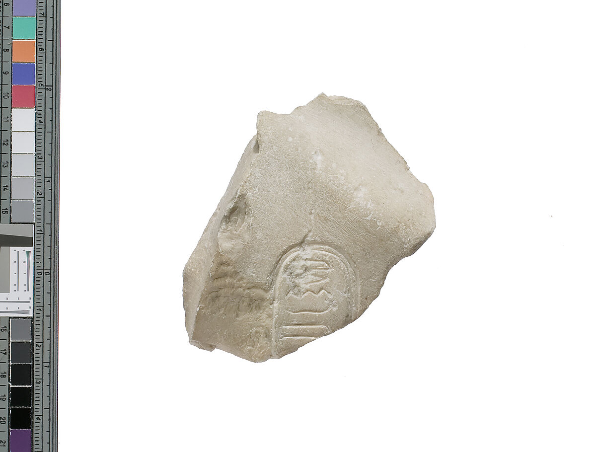 Chest fragment with Aten cartouche, Indurated limestone