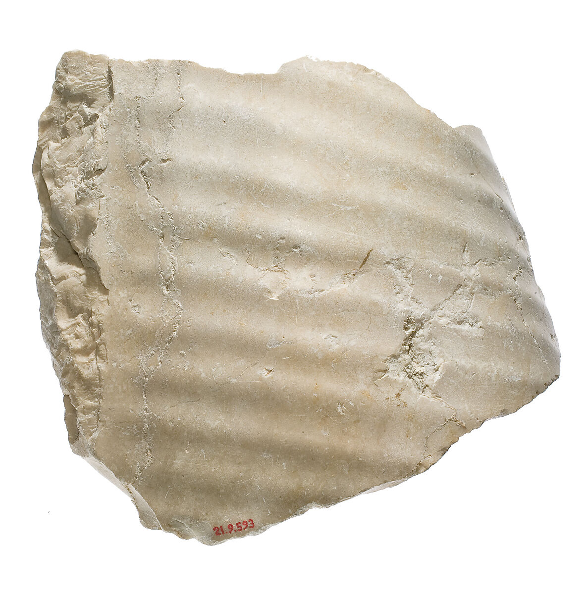 Garment fragment with pleats, probably male, Indurated limestone 