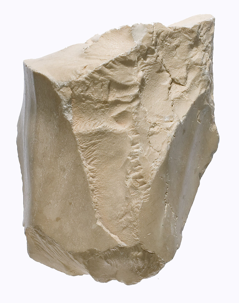 Knee with pleated garment, Indurated limestone 