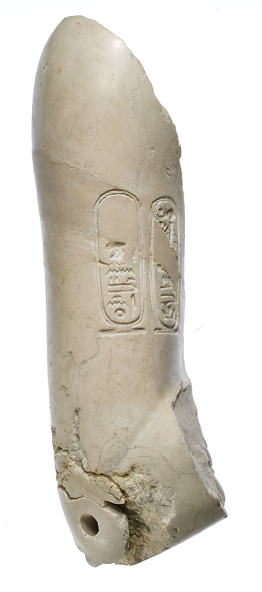 Upper right arm, bent, Aten cartouches, Indurated limestone 