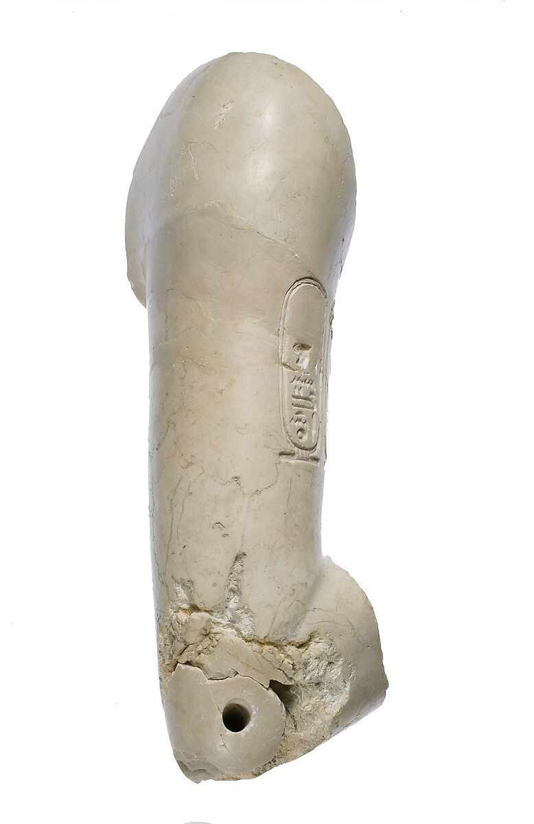 Upper right arm, bent, Aten cartouches, Indurated limestone