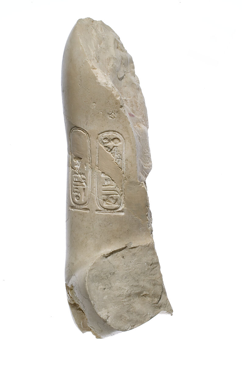 Upper right arm, bent, Aten cartouches, Indurated limestone