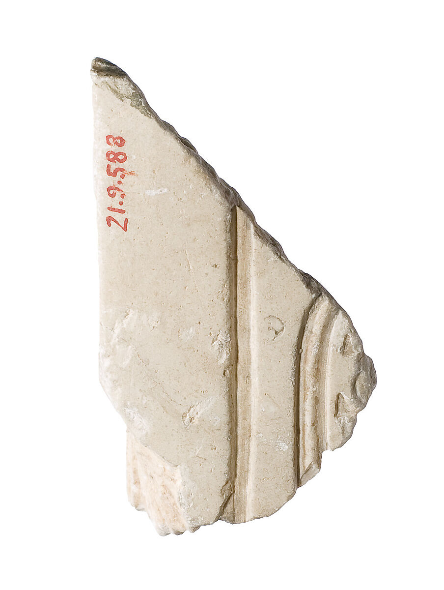 Inscribed corner, Akhenaten prenomen on one surface, Aten cartouche on other, Indurated limestone
