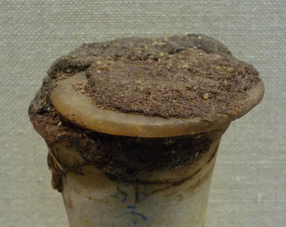Inscribed Ointment Jar From Foundation Deposit 2 of Hatshepsut's Valley Temple, Travertine (Egyptian alabaster), linen