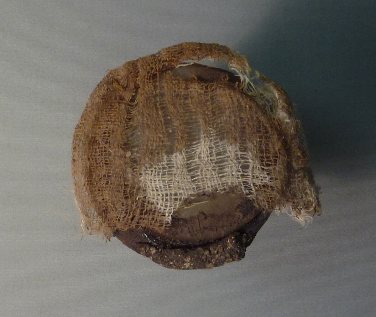 Inscribed Ointment Jar From Foundation Deposit 2 of Hatshepsut's Valley Temple, Travertine (Egyptian alabaster), linen