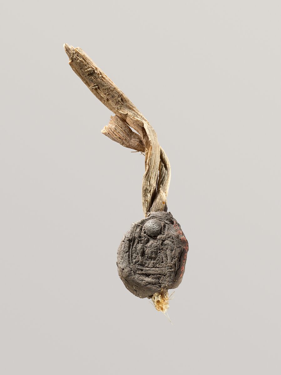 Seal Impression Attatched to a Fiber Tie from Tutankhamun's Embalming Cache, Mud