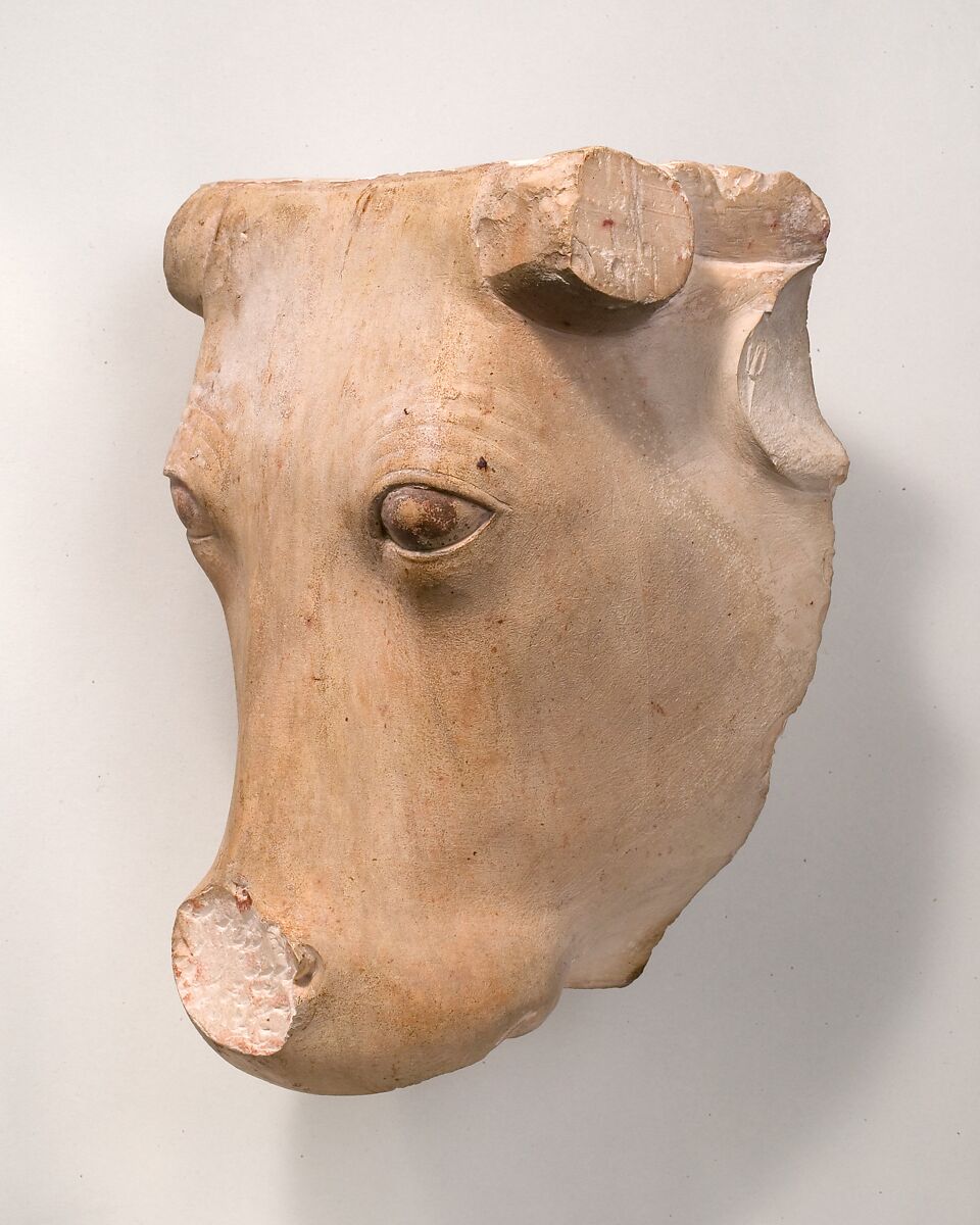 Cow's Head from a frontal representation of a cow emerging from a wall, Limestone, paint traces