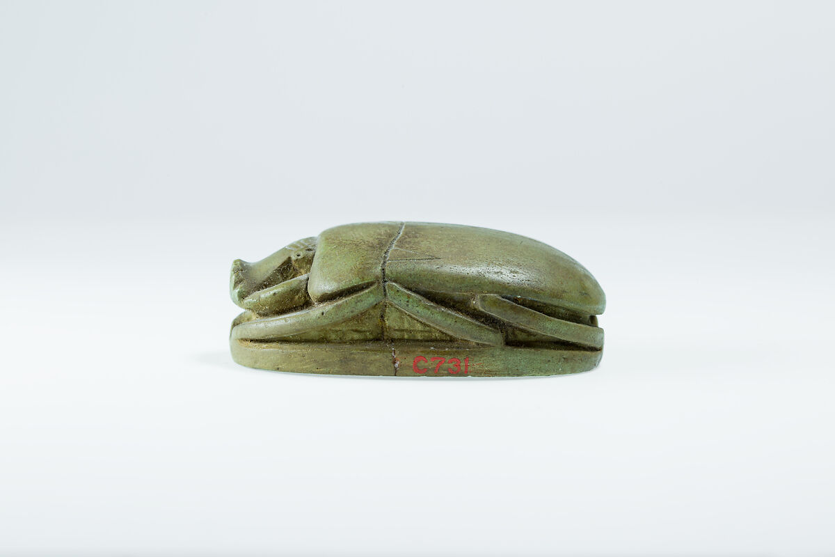 Heart scarab of Singer of Amun Iakaiu, Glass