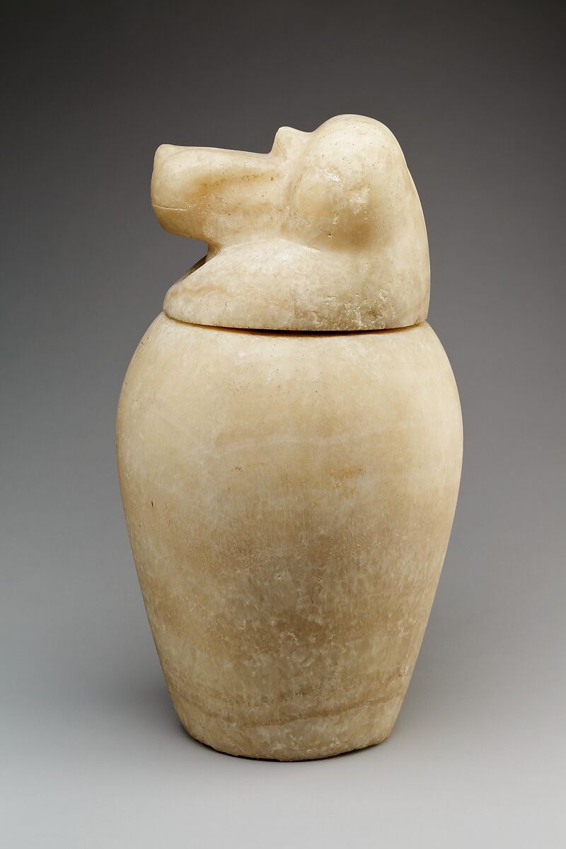 Canopic jar with a baboon-headed lid (Hapy), Travertine (Egyptian alabaster)