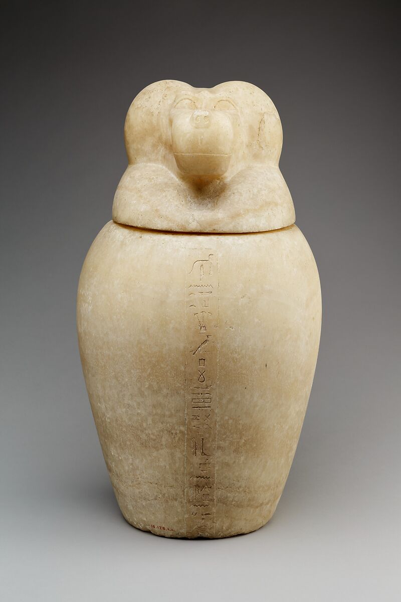 Canopic jar with a baboon-headed lid (Hapy), Travertine (Egyptian alabaster) 