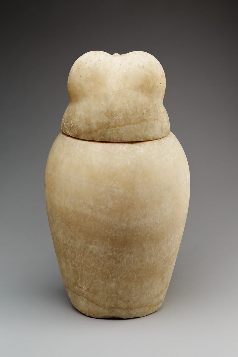 Canopic jar with a baboon-headed lid (Hapy), Travertine (Egyptian alabaster)