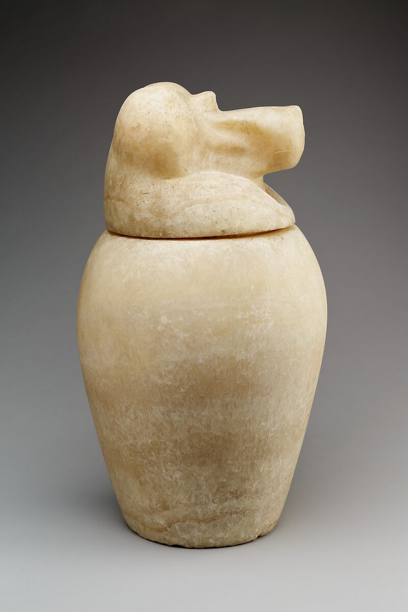 Canopic jar with a baboon-headed lid (Hapy), Travertine (Egyptian alabaster)