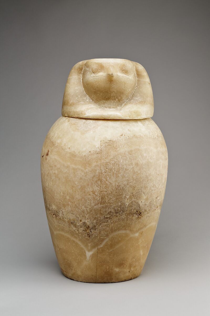 Canopic jar with a falcon-headed lid (Qebehsenuef), Travertine (Egyptian alabaster) 