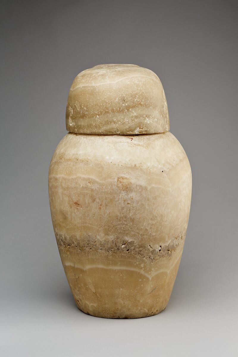 Canopic jar with a falcon-headed lid (Qebehsenuef), Travertine (Egyptian alabaster)