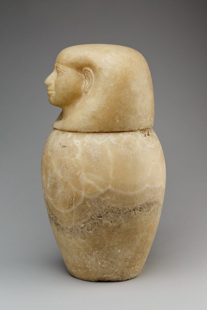 Canopic jar with a human-headed lid, Travertine (Egyptian alabaster)