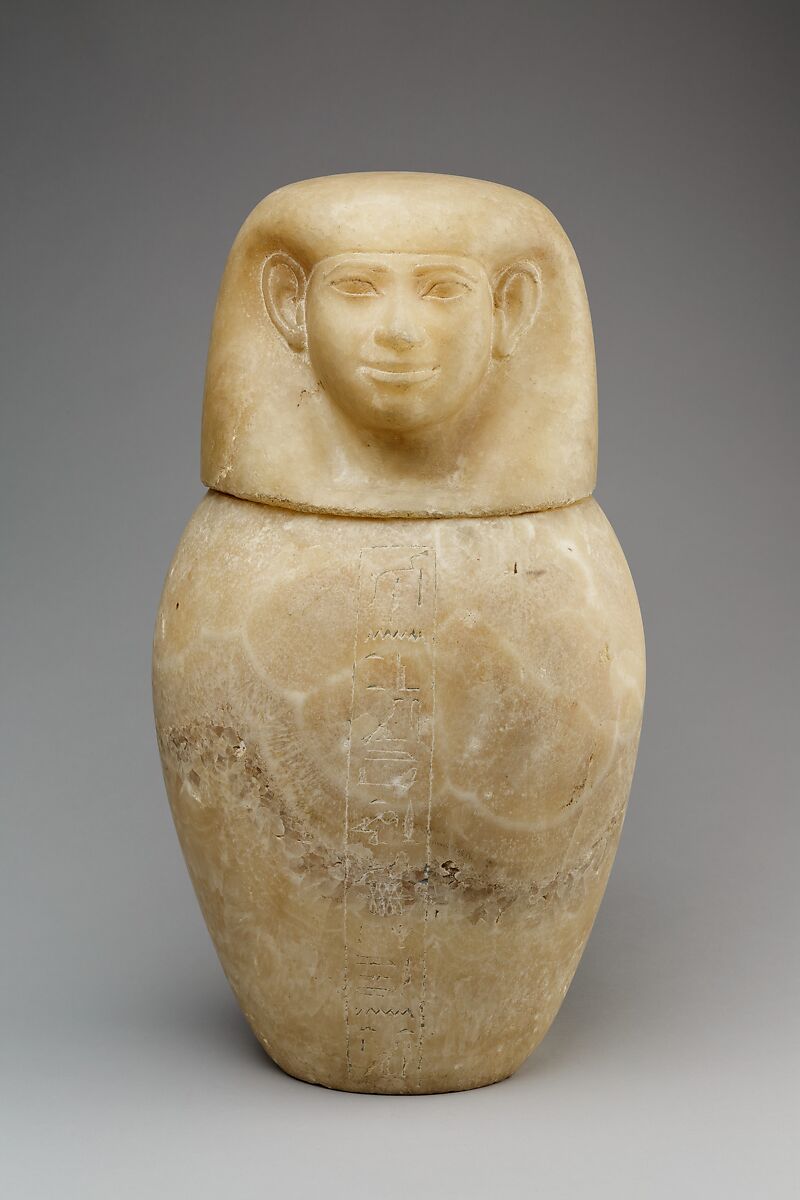 Canopic jar with a human-headed lid, Travertine (Egyptian alabaster) 