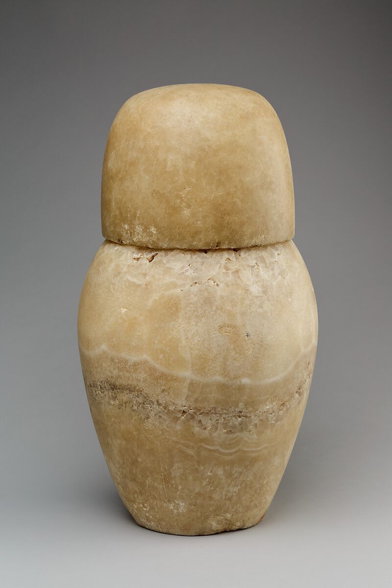 Canopic jar with a human-headed lid, Travertine (Egyptian alabaster)