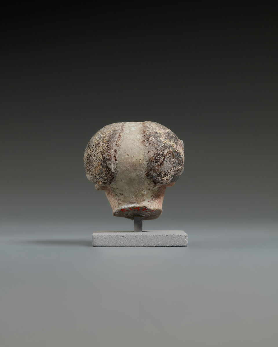 Head from a statuette, perhaps of a dwarf, Faience