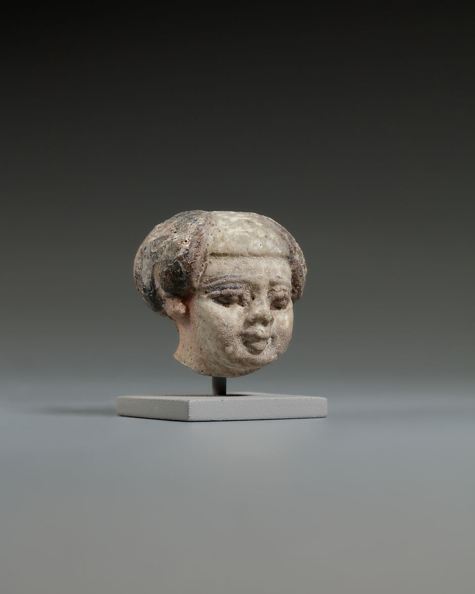 Head from a statuette, perhaps of a dwarf, Faience