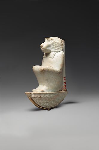 Figure of baboon on a basket and with a pillar, the shebet offering