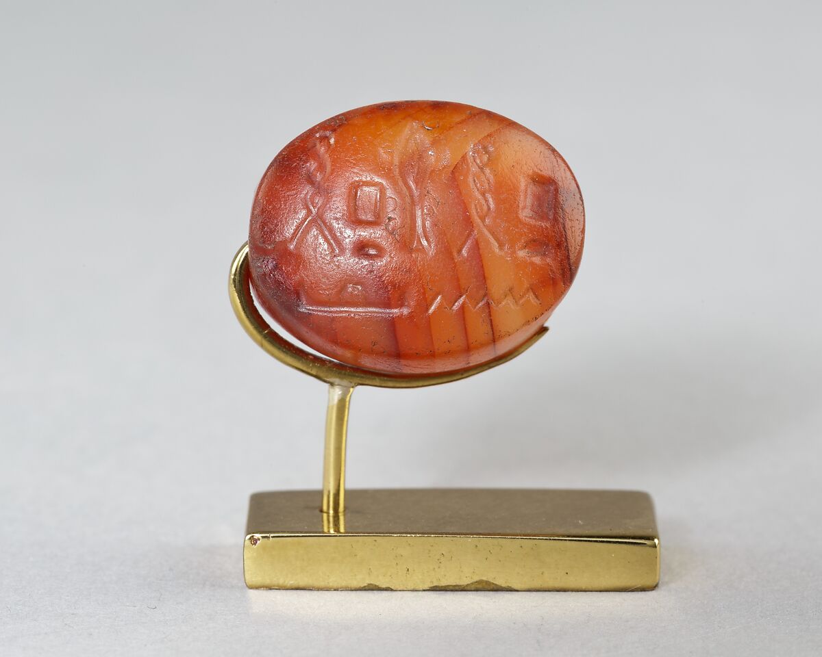 Scaraboid Bead with a device referring to Ptah, Carnelian or red jasper 