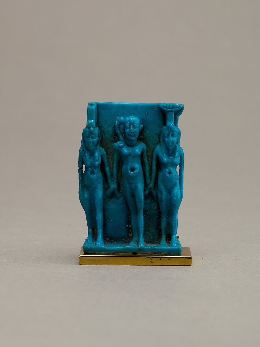 Triad amulet depicting Horus the Child with Isis and Nephthys, Faience