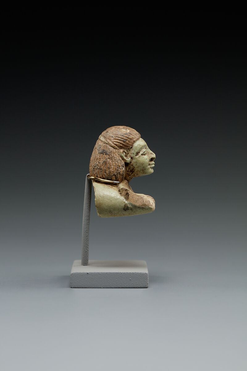 Head and Torso from a Male Swimmer Holding a Spoon, Faience