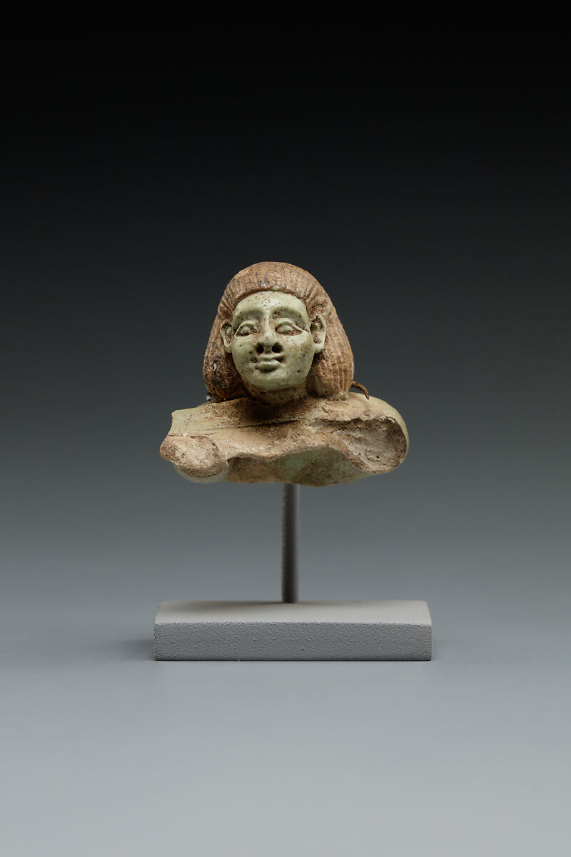 Head and Torso from a Male Swimmer Holding a Spoon, Faience 
