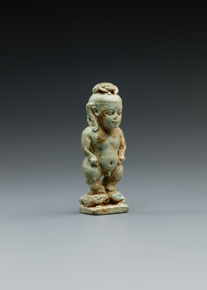 Amulet: Pataikos astride crocodiles and with a scarab on his head, Faience