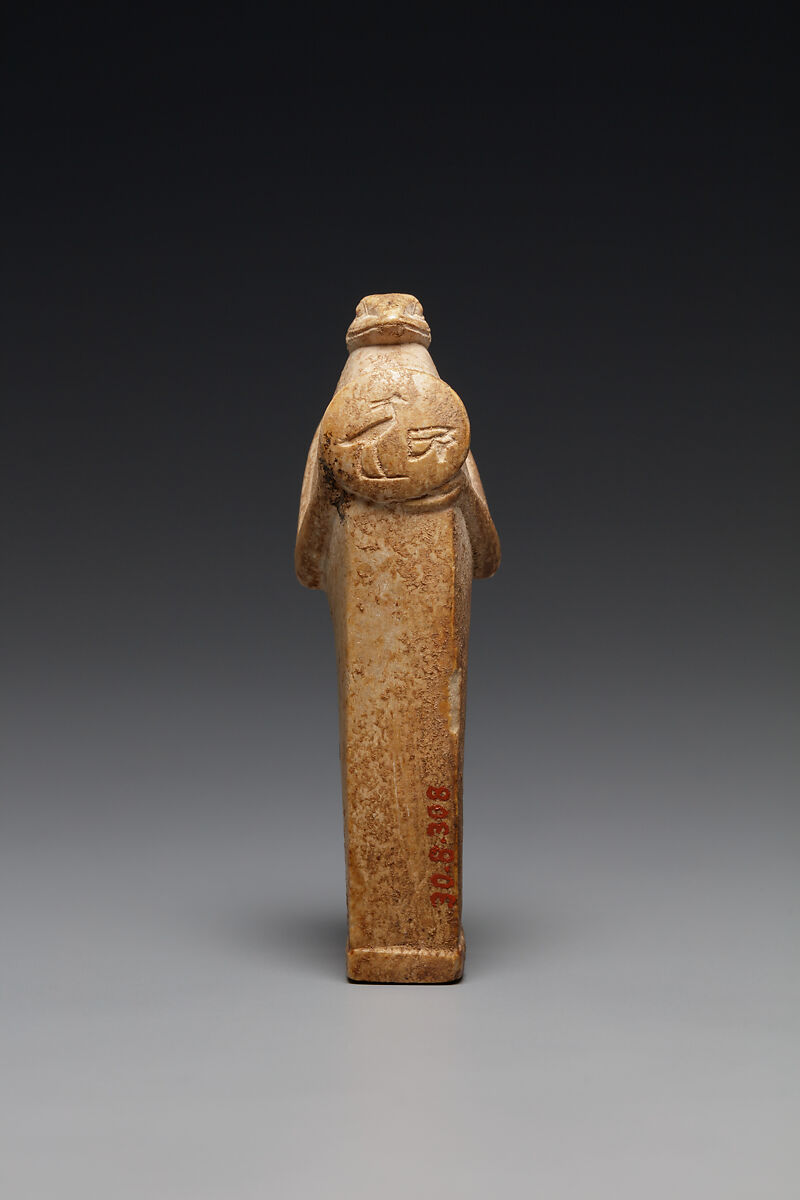 Snake amulet probably representing Atum, Hard Limestone