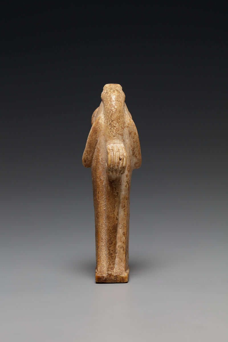 Snake amulet probably representing Atum, Hard Limestone