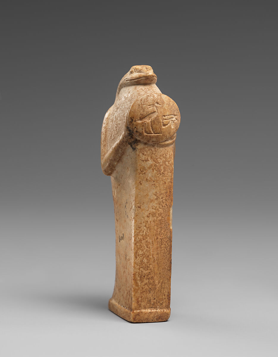 Snake amulet probably representing Atum, Hard Limestone