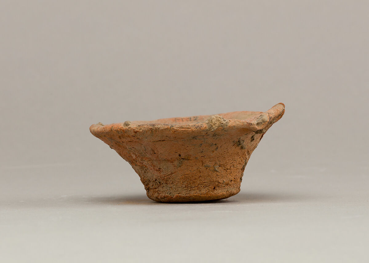 Bowl with stones and carnelian bead, Pottery